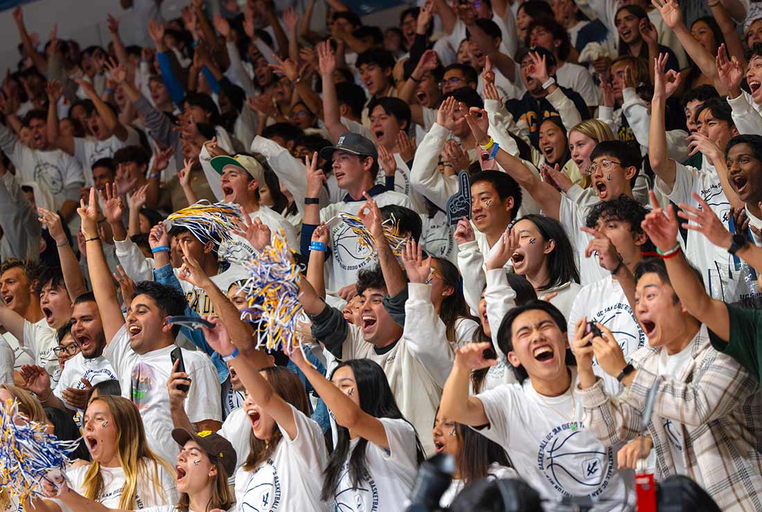 Crowd cheering at a basketball game